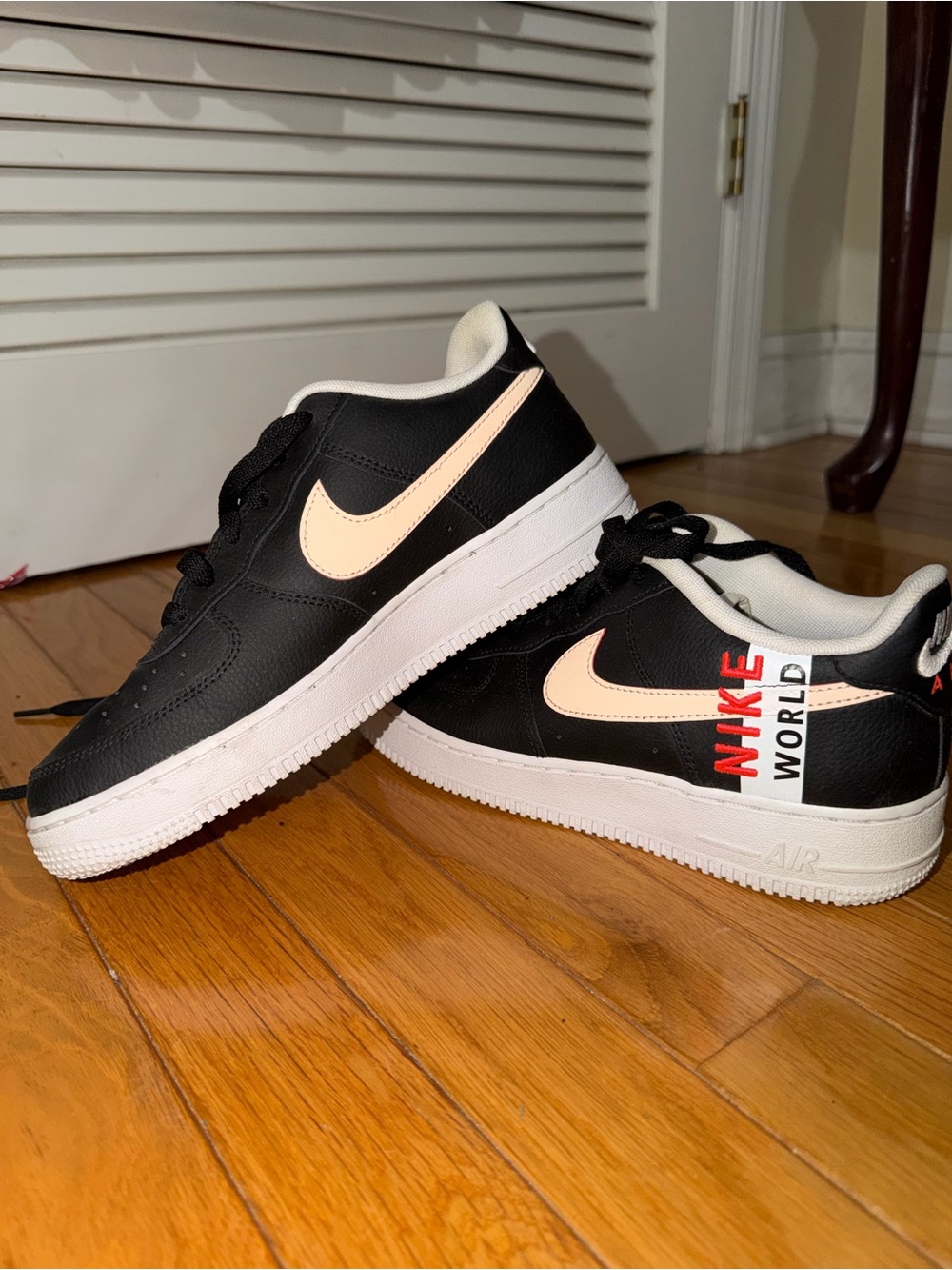 Nike Kids Black Sneakers with Cream Swoosh